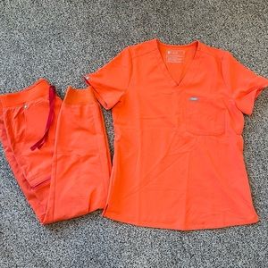 FIGS Scrubs in Sunset Orange